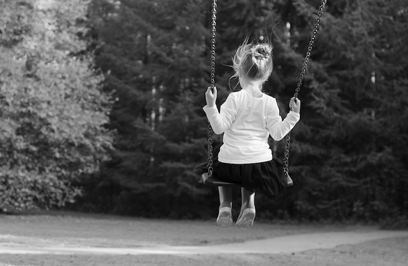 A child enjoying a swing